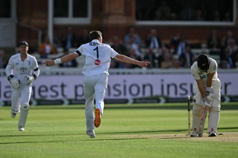 England's Ollie Robinson celebrates taking the wicket of New Zealand's Daryl Mitchell on the opening day of the first Test at Lord's cricket ground in London on June 4, 2026. (AFP) England's Ollie Robinson celebrates taking the wicket of New Zealand's Daryl Mitchell on the opening day of the first Test at Lord's cricket ground in London on June 4, 2026. (AFP)