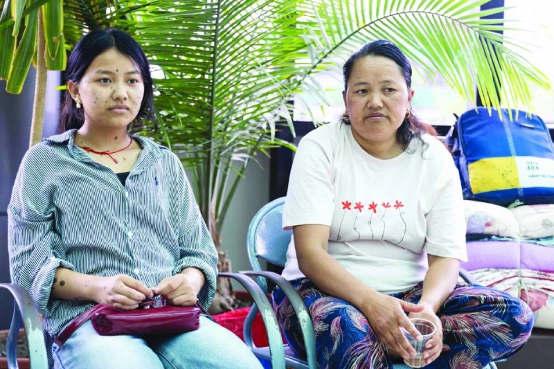 Mountaineer Dawa Sherpa’s wife Damu Sherpa (right) and daughter Mendo Lhamu Sherpa wait outside the intensive care unit at HAMS Hospital in Kathmandu yesterday. (AFP)
Mountaineer Dawa Sherpa’s wife Damu Sherpa (right) and daughter Mendo Lhamu Sherpa wait outside the intensive care unit at HAMS Hospital in Kathmandu yesterday. (AFP)