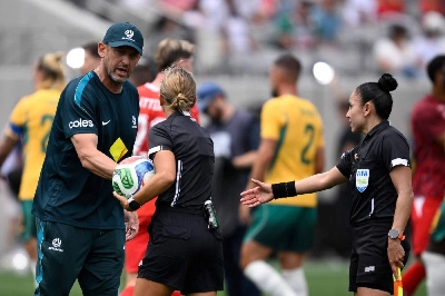 Tony Popovic, head coach of Australia, shakes hands with referee Ekaterina Koroleva after the international friendly against Switzerland at Snapdragon Stadium on June 06, 2026 in San Diego, California. (AFP) Tony Popovic, head coach of Australia, shakes hands with referee Ekaterina Koroleva after the international friendly against Switzerland at Snapdragon Stadium on June 06, 2026 in San Diego, California. (AFP)