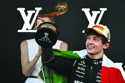 Mercedes' Italian driver Kimi Antonelli celebrates on the podium after winning the Monaco Grand Prix at the Monaco street circuit in Monaco on June 7, 2026. (AFP) Mercedes' Italian driver Kimi Antonelli celebrates on the podium after winning the Monaco Grand Prix at the Monaco street circuit in Monaco on June 7, 2026. (AFP)