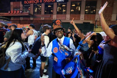 Knicks fans celebrate in New York City after the New York Knicks defeated the San Antonio Spurs in Game 1 of the NBA Finals, on June 3, 2026. As New York prepares to host the World Cup, the city is instead awash in Knicks blue and orange, reflecting a deep love for the gritty, unifying team chasing a historic NBA Finals victory. The Knicks took a commanding 2-0 lead on June 5 in the best of seven series against the San Antonio Spurs, and now the action shifts to the Big Apple for games three and four. (AFP) Knicks fans celebrate in New York City after the New York Knicks defeated the San Antonio Spurs in Game 1 of the NBA Finals, on June 3, 2026. As New York prepares to host the World Cup, the city is instead awash in Knicks blue and orange, reflecting a deep love for the gritty, unifying team chasing a historic NBA Finals victory. The Knicks took a commanding 2-0 lead on June 5 in the best of seven series against the San Antonio Spurs, and now the action shifts to the Big Apple for games three and four. (AFP)