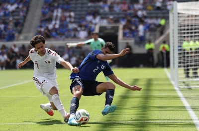 Ahmed Alaaeldin of Qatar battles for the ball with Julio Sibrian of El Salvador during the friendly match at BMO Stadium in Los Angeles, California. (AFP) Ahmed Alaaeldin of Qatar battles for the ball with Julio Sibrian of El Salvador during the friendly match at BMO Stadium in Los Angeles, California. (AFP)