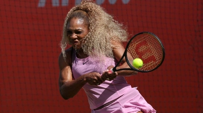 US player Serena Williams hits a shot during her doubles match at the HSBC WTA tennis Championships at Queen's Club in west London on June 9, 2026. (AFP) US player Serena Williams hits a shot during her doubles match at the HSBC WTA tennis Championships at Queen's Club in west London on June 9, 2026. (AFP)