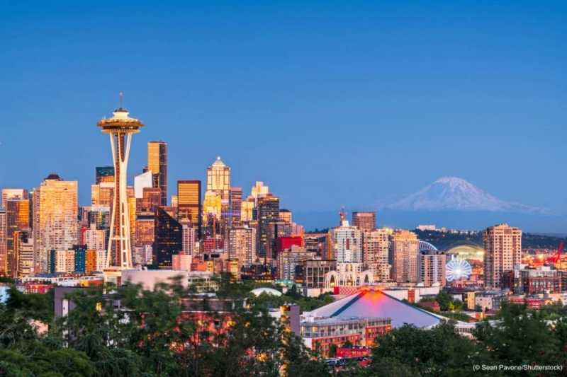 Seattle, Washington, USA downtown skyline at twilight with Mount Rainier. Seattle, Washington, USA downtown skyline at twilight with Mount Rainier.