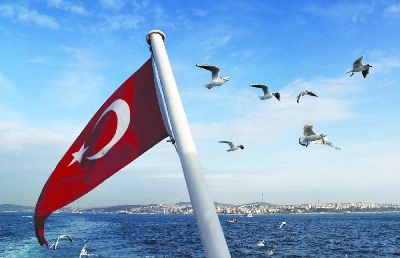 A Turkish flag flies on a passenger ferry with the Bosphorus in the background in Istanbul. Turkey, a major oil and natural gas importer, has faced a surge in energy costs after the Strait of Hormuz was effectively closed. These prices have contributed to annual inflation accelerating for two straight months to 32.6%. A Turkish flag flies on a passenger ferry with the Bosphorus in the background in Istanbul. Turkey, a major oil and natural gas importer, has faced a surge in energy costs after the Strait of Hormuz was effectively closed. These prices have contributed to annual inflation accelerating for two straight months to 32.6%.