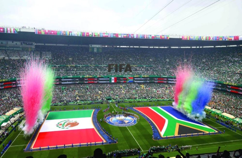 Mexican and South African flags are unfurled during the opening ceremony. Mexican and South African flags are unfurled during the opening ceremony.