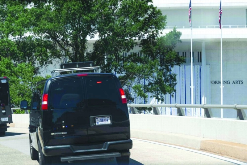 The motorcade of US President Donald Trump drives past a tarp covering the facade of the John F. Kennedy Memorial Center for the Performing Arts in Washington, DC, June 13, 2026. The John F. Kennedy Center for the Performing Arts in the US capital on Saturday said it has removed President Donald Trump's name from its facade following a court ruling. In a legal filing the center's Executive Director Matt Floca said it has "removed all physical signage on the Kennedy Center building and grounds" containing Trump's name. (AFP) The motorcade of US President Donald Trump drives past a tarp covering the facade of the John F. Kennedy Memorial Center for the Performing Arts in Washington, DC, June 13, 2026. The John F. Kennedy Center for the Performing Arts in the US capital on Saturday said it has removed President Donald Trump's name from its facade following a court ruling. In a legal filing the center's Executive Director Matt Floca said it has "removed all physical signage on the Kennedy Center building and grounds" containing Trump's name. (AFP)
