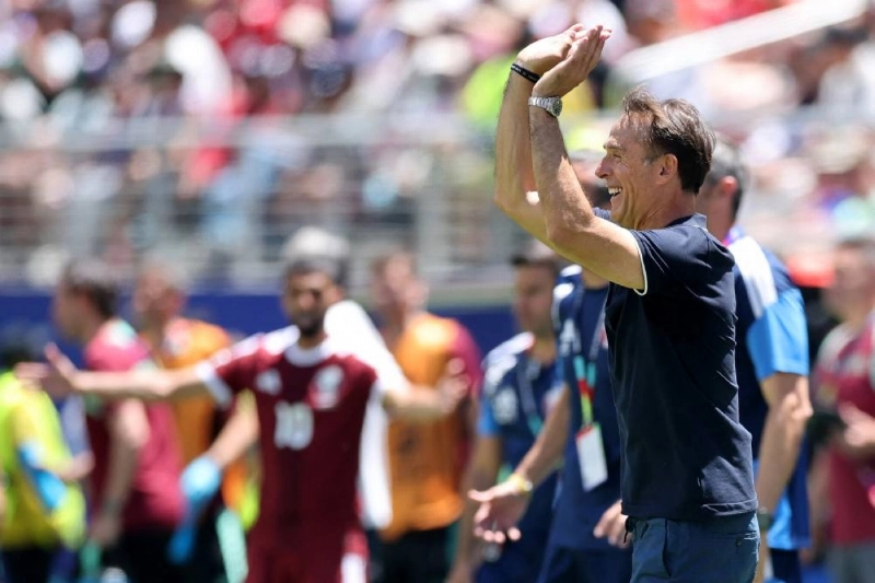 Julen Lopetegui celebrates after Qatar's draw against Switzerland. Julen Lopetegui celebrates after Qatar's draw against Switzerland.