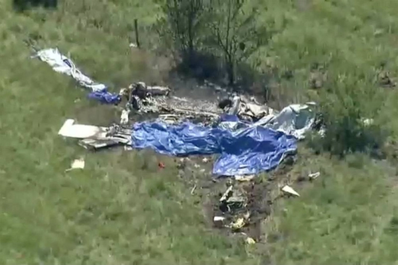 Wreckage lies in a field next to Butler Memorial Airport after a plane carrying skydivers crashed in Butler, Missouri, US, June 14, 2026 in a still image from video. REUTERS Wreckage lies in a field next to Butler Memorial Airport after a plane carrying skydivers crashed in Butler, Missouri, US, June 14, 2026 in a still image from video. REUTERS
