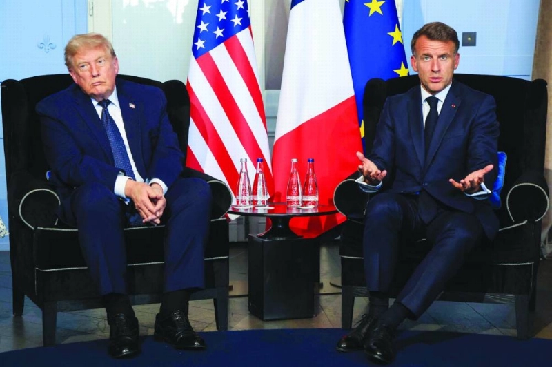 US President Donald Trump (L) attends a bilateral meeting with France's President Emmanuel Macron on the sidelines of the G7 summit, in Evian, central-eastern France on June 15, 2026. A G7 summit is set to take place June 15 to 17 in the French town of Evian-les-Bains near Switzerland and it will be attended by country leaders as well as the EU's foreign policy chief and ministers from Brazil, Canada, the United Arab Emirates and Turkey. (AFP) US President Donald Trump (L) attends a bilateral meeting with France's President Emmanuel Macron on the sidelines of the G7 summit, in Evian, central-eastern France on June 15, 2026. A G7 summit is set to take place June 15 to 17 in the French town of Evian-les-Bains near Switzerland and it will be attended by country leaders as well as the EU's foreign policy chief and ministers from Brazil, Canada, the United Arab Emirates and Turkey. (AFP)