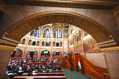 Hungarian Prime Minister Peter Magyar delivers a speech before the agenda in the main hall of the Parliament building in Budapest, on June 15, 2026, as lawmakers vote to amend the constitution, by introducing term-limits for prime ministers to a maximum of eight years in office. The amendment was a key campaign promise of pro-EU conservative Magyar, who ousted Orban from office after 16 straight years in the April elections, promising sweeping reforms as part of a "regime change". (AFP) Hungarian Prime Minister Peter Magyar delivers a speech before the agenda in the main hall of the Parliament building in Budapest, on June 15, 2026, as lawmakers vote to amend the constitution, by introducing term-limits for prime ministers to a maximum of eight years in office. The amendment was a key campaign promise of pro-EU conservative Magyar, who ousted Orban from office after 16 straight years in the April elections, promising sweeping reforms as part of a "regime change". (AFP)