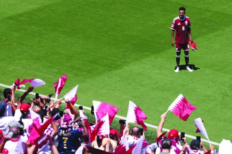 Winger Edmilson Junior celebrates with Qatar fans after the 1-1 draw against Switzerland at San Francisco Bay Area Stadium on Saturday. (AFP) Winger Edmilson Junior celebrates with Qatar fans after the 1-1 draw against Switzerland at San Francisco Bay Area Stadium on Saturday. (AFP)