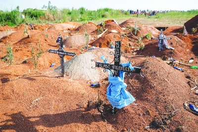 General view of Nyamurongo cemetery, located in Ndibakodu neighborhood, one of the burial sites receiving a large number of people who have died from Ebola virus disease since the beginning of the outbreak, in Bunia, Ituri Province, Democratic Republic of the Congo, on June 13, 2026. (AFP) General view of Nyamurongo cemetery, located in Ndibakodu neighborhood, one of the burial sites receiving a large number of people who have died from Ebola virus disease since the beginning of the outbreak, in Bunia, Ituri Province, Democratic Republic of the Congo, on June 13, 2026. (AFP)
