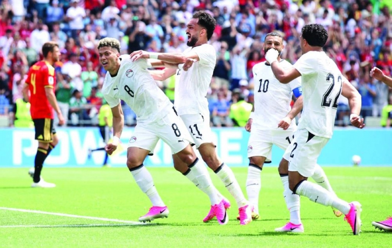 Egypt’s Emam Ashour (left) celebrates after scoring a brilliant goal against Belgium in Seattle on Monday. (AFP)
Egypt’s Emam Ashour (left) celebrates after scoring a brilliant goal against Belgium in Seattle on Monday. (AFP)