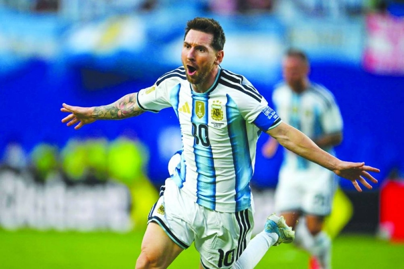 Argentina's forward Lionel Messi celebrates after scoring against Algeria in Kansas City. (AFP) Argentina's forward Lionel Messi celebrates after scoring against Algeria in Kansas City. (AFP)