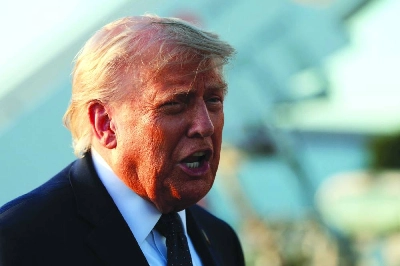 US President Donald Trump speaks to reporters as he arrives at Orly Airport Wednesday. (AFP) US President Donald Trump speaks to reporters as he arrives at Orly Airport Wednesday. (AFP)