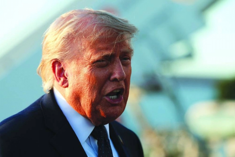 US President Donald Trump speaks to reporters as he arrives at Orly Airport Wednesday. (AFP) US President Donald Trump speaks to reporters as he arrives at Orly Airport Wednesday. (AFP)
