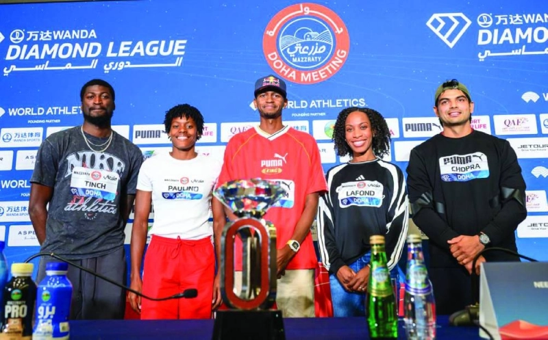 From left: Athletes Cordell Tinch (110m hurdles), Marileidy Paulino (400m), Mutaz Essa Barshim (high jump), Thea Lafond (triple jump) and Neeraj Chopra (javelin) pose after a press conference on Thursday, on the eve of Doha Diamond League. From left: Athletes Cordell Tinch (110m hurdles), Marileidy Paulino (400m), Mutaz Essa Barshim (high jump), Thea Lafond (triple jump) and Neeraj Chopra (javelin) pose after a press conference on Thursday, on the eve of Doha Diamond League.