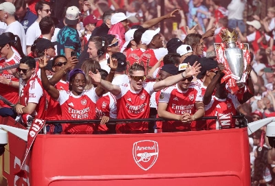 Arsenal's Viktor Gyokeres, Noni Madueke, William Saliba, Bukayo Saka and teammates celebrate with the Premier League trophy during the victory parade in London, Britain, on May 31, 2026. (Reuters)
Arsenal's Viktor Gyokeres, Noni Madueke, William Saliba, Bukayo Saka and teammates celebrate with the Premier League trophy during the victory parade in London, Britain, on May 31, 2026. (Reuters)