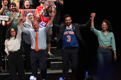 Congressional candidate Claire Valdez, Congressional candidate Brad Lander, Mayor Zohran Mamdani, and Congressional candidate Darializa Avila Chevalier raise their hands during a Get Out the Vote (GOTV) rally at King's Theater on June 18, 2026 in New York City. (AFP) Congressional candidate Claire Valdez, Congressional candidate Brad Lander, Mayor Zohran Mamdani, and Congressional candidate Darializa Avila Chevalier raise their hands during a Get Out the Vote (GOTV) rally at King's Theater on June 18, 2026 in New York City. (AFP)