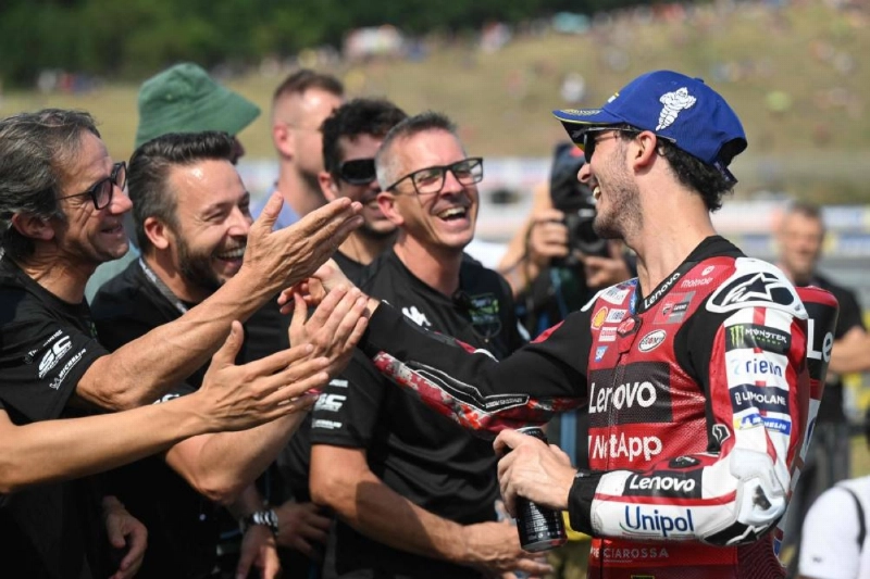 Francesco Bagnaia (right) celebrates with team members after winning the Sprint race of the Czech MotoGP in Brno, Czech Republic, on June 20, 2026. (AFP) Francesco Bagnaia (right) celebrates with team members after winning the Sprint race of the Czech MotoGP in Brno, Czech Republic, on June 20, 2026. (AFP)