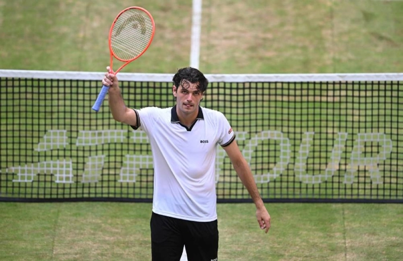 Taylor Fritz of the US celebrates winning the singles semi-final against Germany's Alexander Zverev at the Halle Open, western Germany, on June 20, 2026. Taylor won 7-6, 4-6,5-7. (AFP) Taylor Fritz of the US celebrates winning the singles semi-final against Germany's Alexander Zverev at the Halle Open, western Germany, on June 20, 2026. Taylor won 7-6, 4-6,5-7. (AFP)