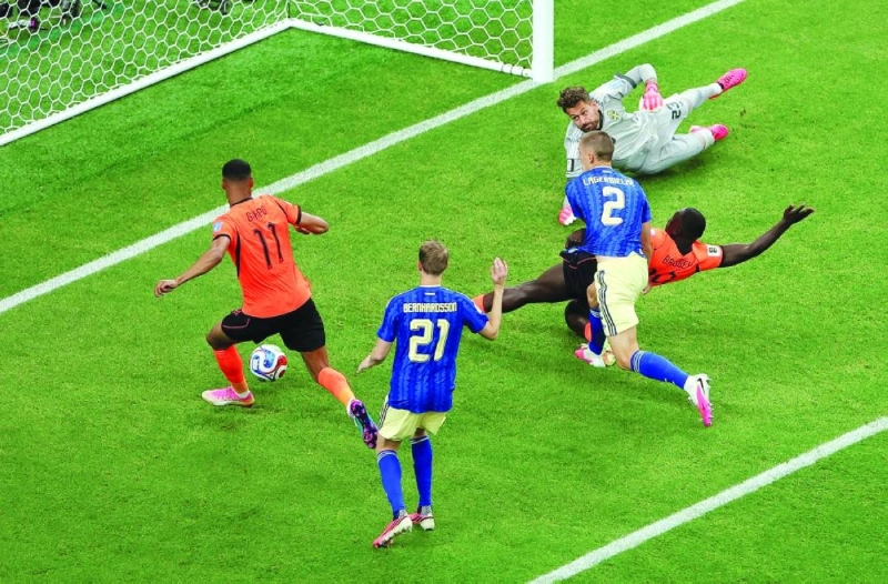 Cody Gakpo #11 of the Netherlands scores his team's third goal during the FIFA World Cup 2026 Group F match between Netherlands and Sweden at Houston Stadium on June 20, 2026 in Houston, Texas. (AFP) Cody Gakpo #11 of the Netherlands scores his team's third goal during the FIFA World Cup 2026 Group F match between Netherlands and Sweden at Houston Stadium on June 20, 2026 in Houston, Texas. (AFP)
