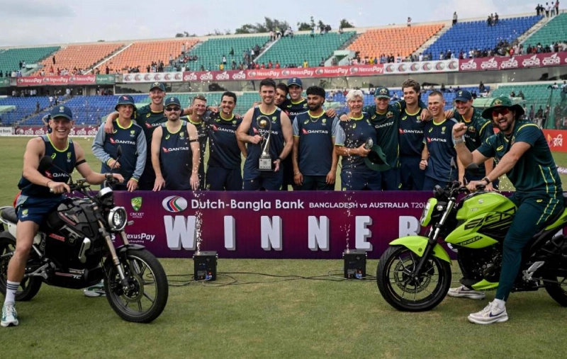 Australia's captain Mitchell Marsh (centre) holds the series trophy alongside teammates during the presentation ceremony as they celebrate their team's win at the end of the third Twenty20 (T20) international against Bangladesh in Chattogram on June 21, 2026. (AFP) Australia's captain Mitchell Marsh (centre) holds the series trophy alongside teammates during the presentation ceremony as they celebrate their team's win at the end of the third Twenty20 (T20) international against Bangladesh in Chattogram on June 21, 2026. (AFP)