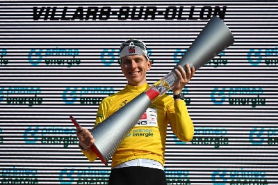 UAE Team Emirates-XRG's Slovenian rider Tadej Pogacar celebrates on the podium after winning the Men's Tour of Switzerland (Tour de Suisse) cycling race, in Villars-sur-Ollon Switzerland, on June 21, 2026. (AFP) UAE Team Emirates-XRG's Slovenian rider Tadej Pogacar celebrates on the podium after winning the Men's Tour of Switzerland (Tour de Suisse) cycling race, in Villars-sur-Ollon Switzerland, on June 21, 2026. (AFP)