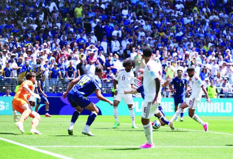 Qatar captain Hassan al-Haydos (right) scored from close range in the 42nd minute to drag his team back into contest. (AFP) Qatar captain Hassan al-Haydos (right) scored from close range in the 42nd minute to drag his team back into contest. (AFP)
