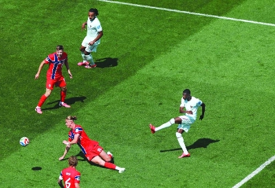 France's Ousmane Dembele scores against Norway during the FIFA World Cup Group I match in Foxborough, Massachusetts. (AFP) France's Ousmane Dembele scores against Norway during the FIFA World Cup Group I match in Foxborough, Massachusetts. (AFP)