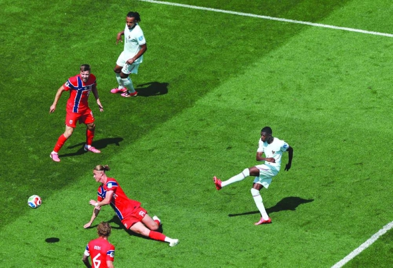 France's Ousmane Dembele scores against Norway during the FIFA World Cup Group I match in Foxborough, Massachusetts. (AFP) France's Ousmane Dembele scores against Norway during the FIFA World Cup Group I match in Foxborough, Massachusetts. (AFP)