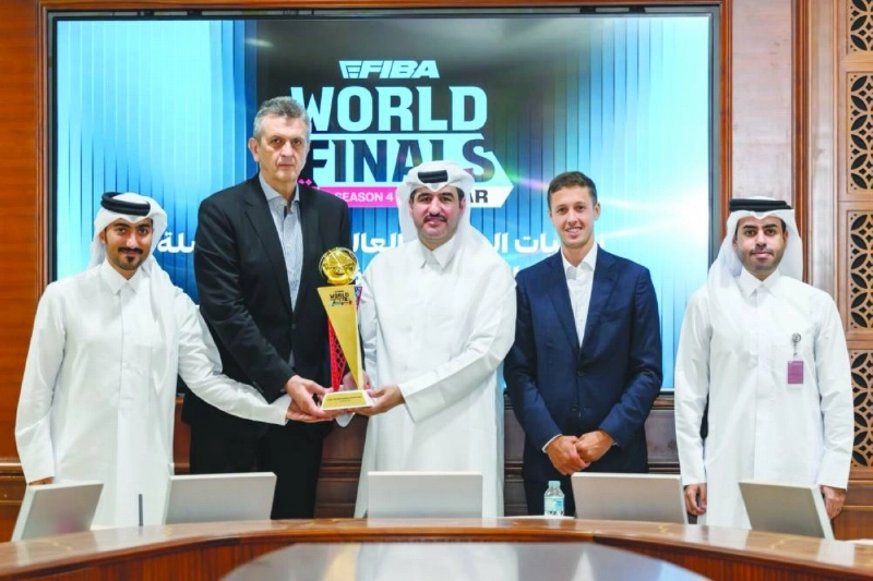 FIBA and Organising Committee officials pose after a press conference to announce the details of eFIBA World Finals Qatar. FIBA and Organising Committee officials pose after a press conference to announce the details of eFIBA World Finals Qatar.