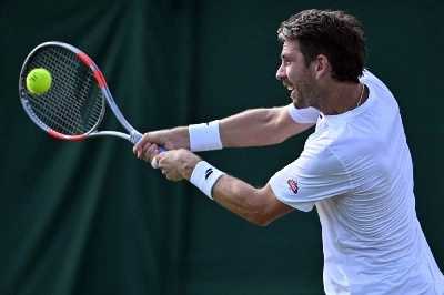 Britain's Cameron Norrie returns the ball against US player Michael Zheng during their first round match on the first day of the 2026 Wimbledon Championships at The All England Lawn Tennis and Croquet Club in Wimbledon, southwest London, on June 29, 2026. (AFP) Britain's Cameron Norrie returns the ball against US player Michael Zheng during their first round match on the first day of the 2026 Wimbledon Championships at The All England Lawn Tennis and Croquet Club in Wimbledon, southwest London, on June 29, 2026. (AFP)