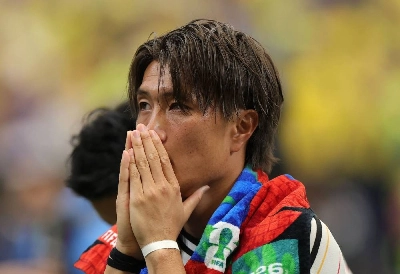 HOUSTON, TEXAS - JUNE 29: Koki Ogawa #19 of Japan reacts after the 1-2 loss during the FIFA World Cup 2026 Round Of 32 match between Brazil and Japan at Houston Stadium on June 29, 2026 in Houston, Texas. Alex Slitz/Getty Images/AFP (Photo by Alex Slitz / GETTY IMAGES NORTH AMERICA / Getty Images via AFP) HOUSTON, TEXAS - JUNE 29: Koki Ogawa #19 of Japan reacts after the 1-2 loss during the FIFA World Cup 2026 Round Of 32 match between Brazil and Japan at Houston Stadium on June 29, 2026 in Houston, Texas. Alex Slitz/Getty Images/AFP (Photo by Alex Slitz / GETTY IMAGES NORTH AMERICA / Getty Images via AFP)
