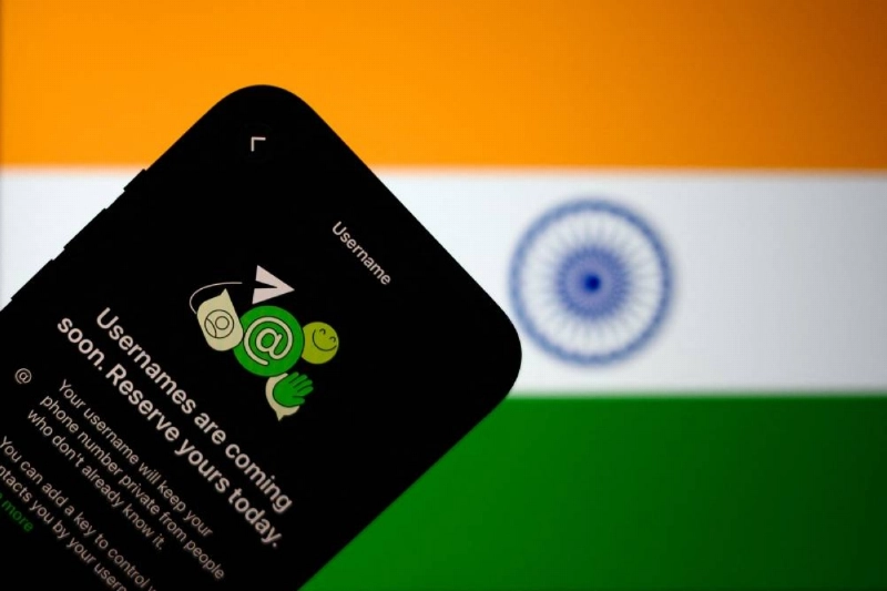 This illustration photograph taken Thursday shows the new upcoming Usernamer feature on US instant messaging software WhatsApp, displayed on a smartphone with the backdrop of India’s national flag in New Delhi. (AFP) This illustration photograph taken Thursday shows the new upcoming Usernamer feature on US instant messaging software WhatsApp, displayed on a smartphone with the backdrop of India’s national flag in New Delhi. (AFP)