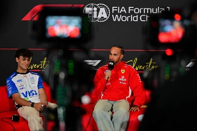 Racing Bulls' British driver Arvid Lindblad (left) and Ferrari's British driver Lewis Hamilton (centre) attend a press conference ahead of the British Grand Prix at the Silverstone motor racing circuit in Silverstone, central England, on July 2, 2026. (AFP) Racing Bulls' British driver Arvid Lindblad (left) and Ferrari's British driver Lewis Hamilton (centre) attend a press conference ahead of the British Grand Prix at the Silverstone motor racing circuit in Silverstone, central England, on July 2, 2026. (AFP)