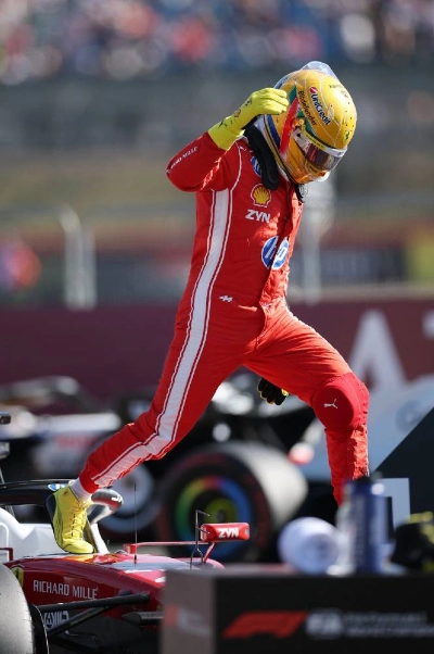 Ferrari's Lewis Hamilton celebrates after qualifying in pole position for the sprint race at the British Grand Prix at Silverstone Circuit on July 3, 2026. (Reuters) Ferrari's Lewis Hamilton celebrates after qualifying in pole position for the sprint race at the British Grand Prix at Silverstone Circuit on July 3, 2026. (Reuters)