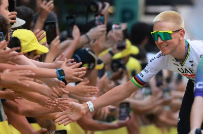 UAE Team Emirates XRG's Tadej Pogacar with the spectators during the presentation ahead of the Tour de France in Barcelona, Spain. (Reuters) UAE Team Emirates XRG's Tadej Pogacar with the spectators during the presentation ahead of the Tour de France in Barcelona, Spain. (Reuters)