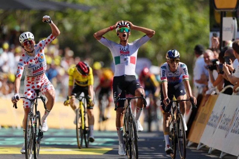 UAE Team Emirates XRG's Isaac Del Toro celebrates winning stage 2 alongside teammate Tadej Pogacar at the Tour de France in Barcelona, Spain, on Sunday. (Reuters) UAE Team Emirates XRG's Isaac Del Toro celebrates winning stage 2 alongside teammate Tadej Pogacar at the Tour de France in Barcelona, Spain, on Sunday. (Reuters)