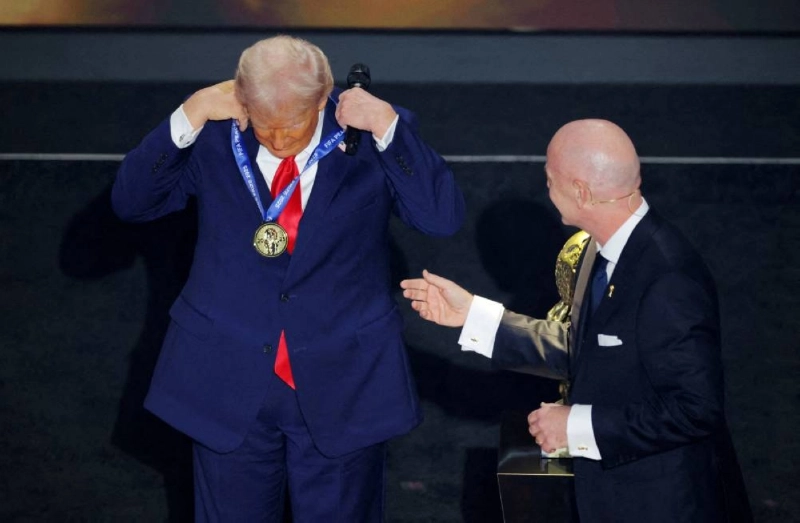 US President Donald Trump on stage with FIFA President Gianni Infantino as he is awarded the FIFA Peace Prize at John F. Kennedy Center for the Performing Arts, Washington, DC, US, on December 5, 2025. (Reuters) US President Donald Trump on stage with FIFA President Gianni Infantino as he is awarded the FIFA Peace Prize at John F. Kennedy Center for the Performing Arts, Washington, DC, US, on December 5, 2025. (Reuters)