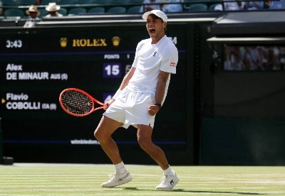 Italy's Flavio Cobolli celebrates after winning his fourth-round match against Australia's Alex de Minaur on Monday. (Reuters) Italy's Flavio Cobolli celebrates after winning his fourth-round match against Australia's Alex de Minaur on Monday. (Reuters)