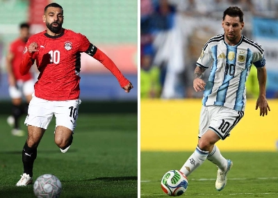 Mohamed Salah (L); and Lionel Messi (R): AFP Mohamed Salah (L); and Lionel Messi (R): AFP
