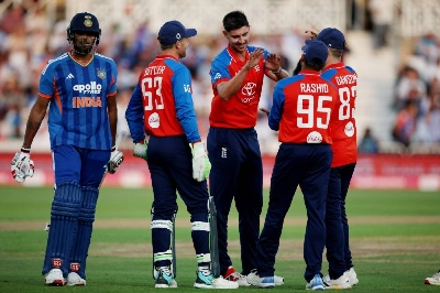 England's Josh Tongue celebrates with teammates after taking the wicket of India's Harshit Rana caught out by England's Tom Banton on Tuesday. (Reuters) England's Josh Tongue celebrates with teammates after taking the wicket of India's Harshit Rana caught out by England's Tom Banton on Tuesday. (Reuters)