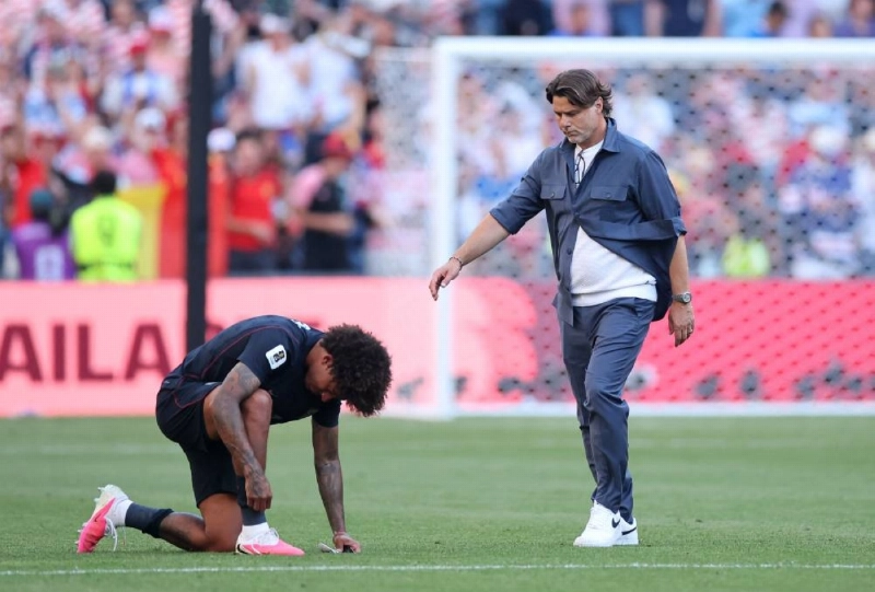 Chris Richards of the United States is consoled by Mauricio Pochettino, Head Coach of the United States, after the team's 1-4 defeat in the FIFA World Cup 2026 Round of 16 match against Belgium at Seattle Stadium on July 06, 2026 in Seattle, Washington. (AFP) Chris Richards of the United States is consoled by Mauricio Pochettino, Head Coach of the United States, after the team's 1-4 defeat in the FIFA World Cup 2026 Round of 16 match against Belgium at Seattle Stadium on July 06, 2026 in Seattle, Washington. (AFP)