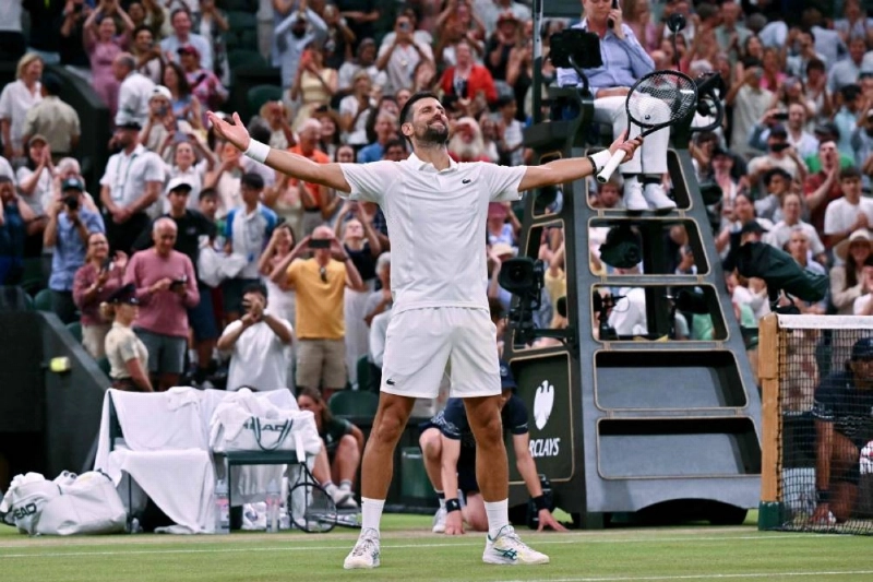 Serbia's Novak Djokovic celebrates winning against Canada's Felix Auger-Aliassime during their quarter-final on the ninth day of the 2026 Wimbledon Championships at The All England Lawn Tennis and Croquet Club in Wimbledon, southwest London, on July 7, 2026. (AFP)
Serbia's Novak Djokovic celebrates winning against Canada's Felix Auger-Aliassime during their quarter-final on the ninth day of the 2026 Wimbledon Championships at The All England Lawn Tennis and Croquet Club in Wimbledon, southwest London, on July 7, 2026. (AFP)