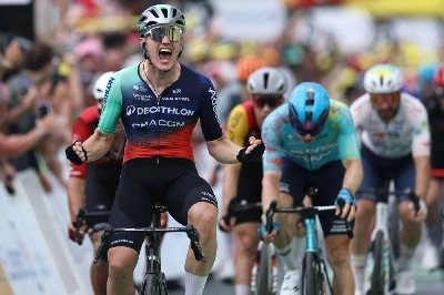 Decathlon CMA CGM Team's Dutch rider Olav Kooij cycles to the finish line to win the 5th stage of the Tour de France ahead of XDS Astana Team’s German rider Max Kanter (right) in Pau, France, on July 8, 2026. (AFP) Decathlon CMA CGM Team's Dutch rider Olav Kooij cycles to the finish line to win the 5th stage of the Tour de France ahead of XDS Astana Team’s German rider Max Kanter (right) in Pau, France, on July 8, 2026. (AFP)