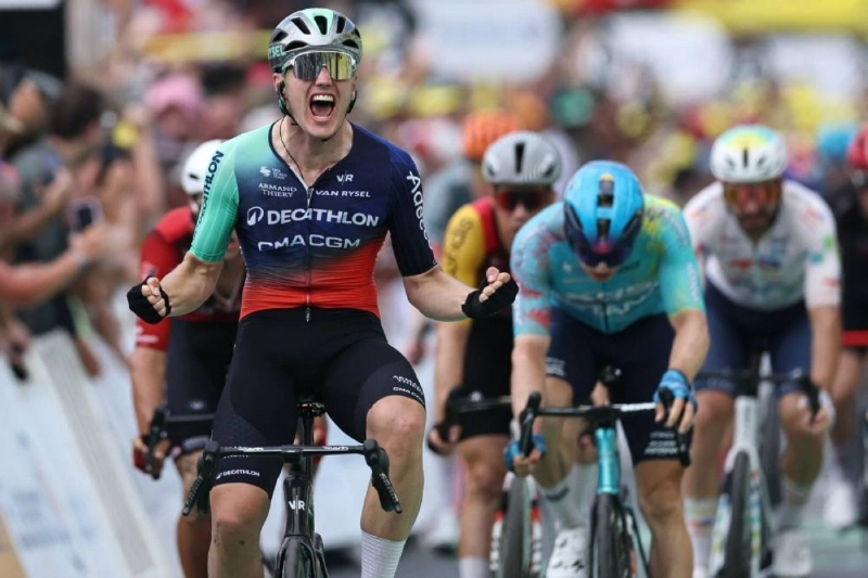 Decathlon CMA CGM Team's Dutch rider Olav Kooij cycles to the finish line to win the 5th stage of the Tour de France ahead of XDS Astana Team’s German rider Max Kanter (right) in Pau, France, on July 8, 2026. (AFP) Decathlon CMA CGM Team's Dutch rider Olav Kooij cycles to the finish line to win the 5th stage of the Tour de France ahead of XDS Astana Team’s German rider Max Kanter (right) in Pau, France, on July 8, 2026. (AFP)