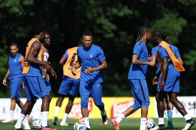 France's forward Kylian Mbappe (centre) takes part in a training session at Bentley University in Waltham, near Boston, on July 8, 2026, on the eve of the World Cup quarter-final against Morocco. (AFP) France's forward Kylian Mbappe (centre) takes part in a training session at Bentley University in Waltham, near Boston, on July 8, 2026, on the eve of the World Cup quarter-final against Morocco. (AFP)