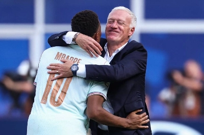 France's forward Kylian Mbappe and head coach Didier Deschamps hug after winning the World Cup quarter-final against Morocco at Boston Stadium in Foxborough on July 9, 2026. (AFP) France's forward Kylian Mbappe and head coach Didier Deschamps hug after winning the World Cup quarter-final against Morocco at Boston Stadium in Foxborough on July 9, 2026. (AFP)